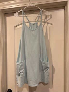 Small aqua blue loose athletic dress with built in tank and shorts , never worn